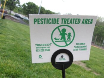 A pesticide flag on Veteran's Field last year.
