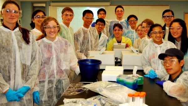 Dan Li, center, with fellow students in the biochemistry lab at Drew University.
