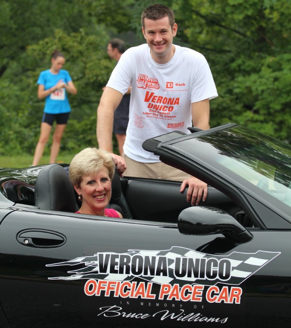 Kathy and Bryan Williams man the pace car in honor of Bruce Williams, who died earlier this year.