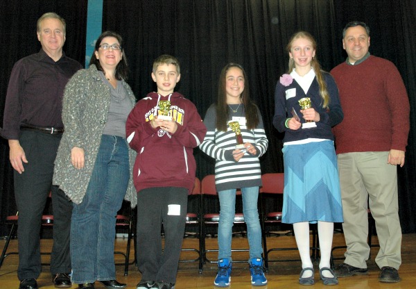 The spelling bee winners and the judges pose for a picture. (From left to right) Mayor Manley, Principal DiGiacomo, Christian Castner, Karina Squilanti, Veronica Domyslawski and Principal Monacelli.