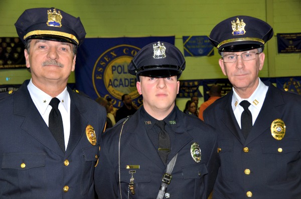 T.J. Conroy, center, with Verona Police Chief Doug Huber (l) and Captain Mitchell Stern (r)