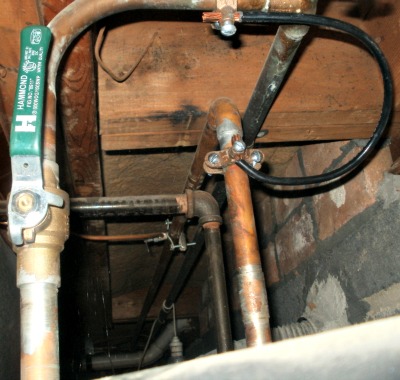 Ask your electrician to make sure you have proper ground jumper wiring at the water meter and hot water heater.