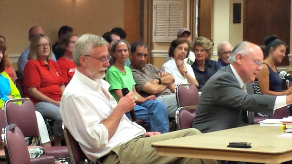 Lars Sternas, left, told the Planning Board how the DMH2 project would affect his home, which is just 5 feet from the property line.
