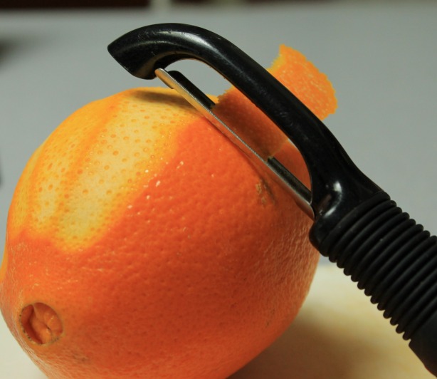 Use a vegetable peeler for the zest- it will be ground up in the food processor