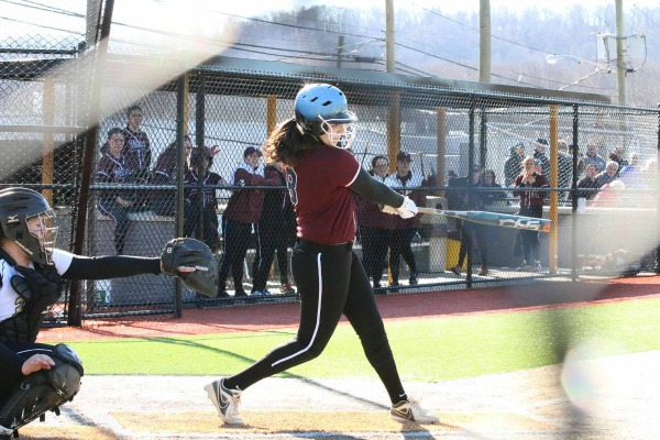 On her first swing in her first time at bat this season, senior Olivia Feiger scored an out-of-the-park home run.