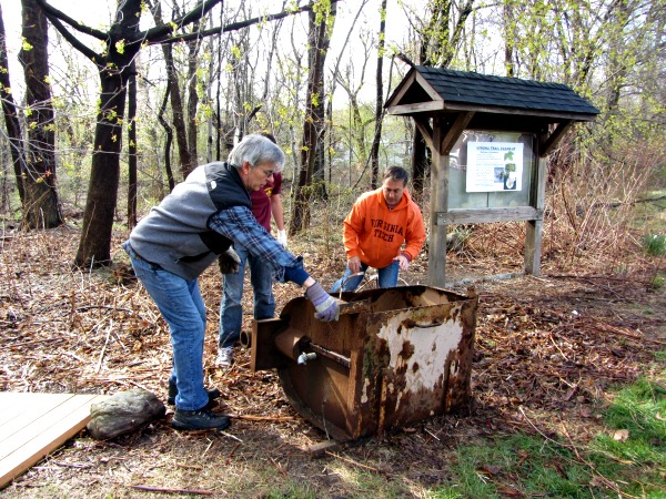 VEC Vice Chair Tony Saltalamacchia and VEC member Jim Loudon removing an old boiler from the Peckman Trail during one of the cleanups last year. 