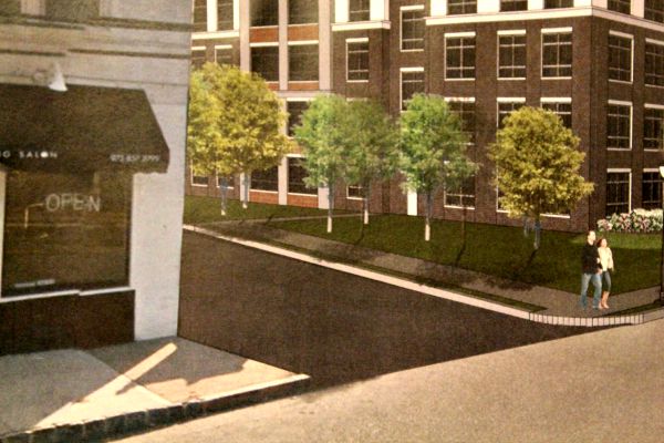 DNR super-imposed the renderings of its new buildings on a photo of the existing streetscape.