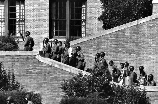 Photos showed the stark reality of the civil-rights movement, like the need for federal soldiers in the integration of Little Rock's public schools in 1957. 