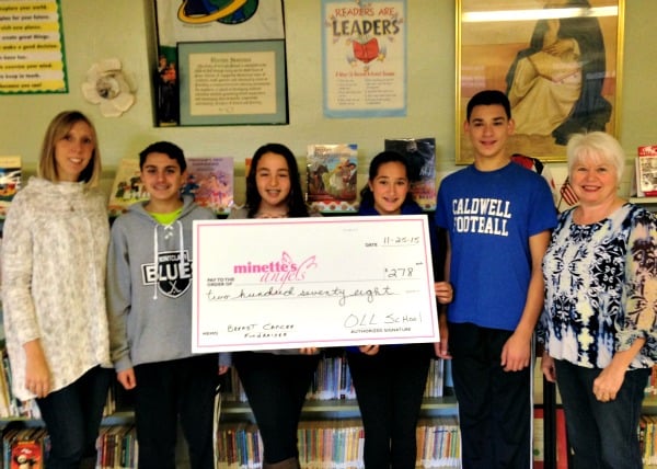 OLL teacher Mrs. Berzanskis and students Stanley Duwal IV, Elena Tyndall , Elizabeth Conti and James Conti, and Patty Farley, treasurer of Minette's Angels