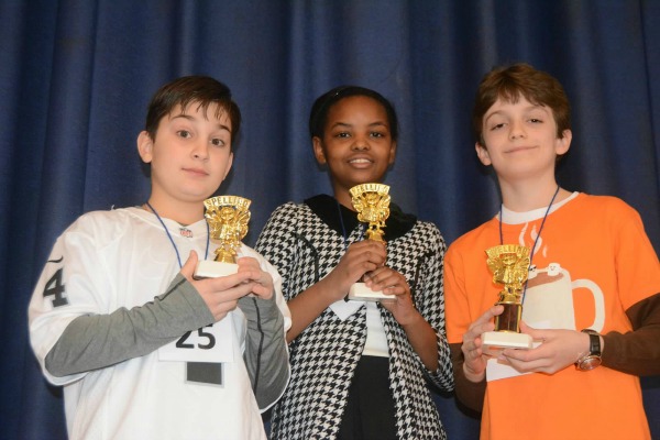 Philip Konrad-Parisi (far right) is competing in the state spelling bee this weekend. He's seen here with, Julian Santorelli and Stephanie Mutuku, who finished third and first respectively in the Verona Juniors' annual Spelling Bee.