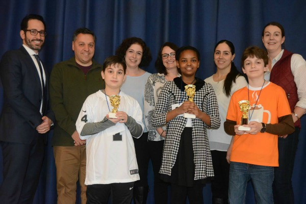 Verona's students impressed the judges with their spelling skills at the Verona Juniors' annual spelling bee. Pictured are (l-r) Rui M. Dionisio, Superintendent of Schools, Jeff Monacelli, Principal of Forest Avenue Elementary School, Julian Santorelli, Verona Junior Woman's Club President Christine McGrath, Corisa Walker, Library Media Specialist, F.N. Brown and Brookdale Schools, Stephanie Mutuku, Diana Weeks, spelling bee co-chair, Philip Konrad-Parisi, and Stacy Williamson, spelling bee co-chair.