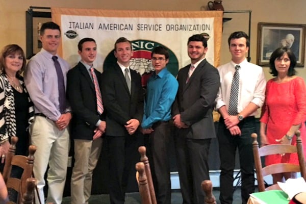 UNICO President Nicolina Carpinelli (left) with UNICO Scholarship Committee member Nancy Magrans (right) and the six scholarship winners for 2016: Christopher Festa, Ryan Ramsthaler, Anthony Giuliano, Patrick Citrano, Mark Riggio and George Tamburino.