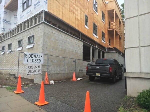 De Mattheis' construction crews arrived Tuesday morning to find access blocked by traffic cones and a pickup truck.