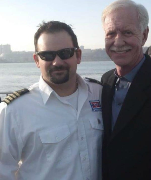 Lombardi with the real Sully, Capt. Chesley Sullenberger.