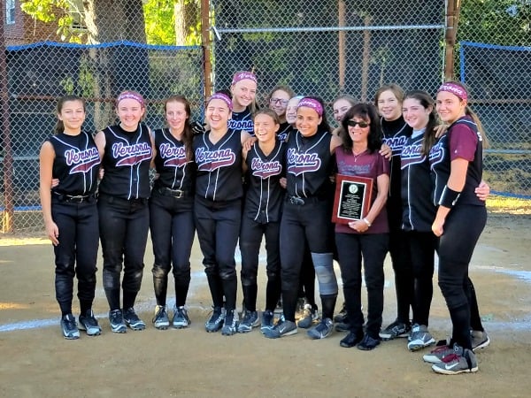 Cindi DaRin, fourth from right, is surrounded by VBSL’s 14u softball team at the recent softball tournament honoring the late Tom DaRin, a long-time VBSL coach and VHS softball supporter. DaRin was presented with a plaque from the VBSL and VHS Softball Boosters honoring his commitment to the sport in Verona. Joining DaRin are, from left: Angel Fauerbach, Jordan Stafford, Annie Swanstrom, Nicole Imbriano, Annie Johnson, Jessie Loudon, Carlie Goldstein, Olivia Garcia, Jenna DaRin, Sinclaire Infusino, Megan Meehan, Melanie Naeris and Savannah Szamborski.