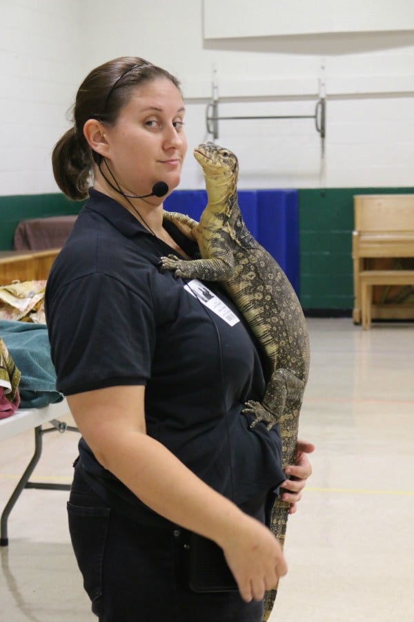 Erin Mellini with a black and white Tegu.