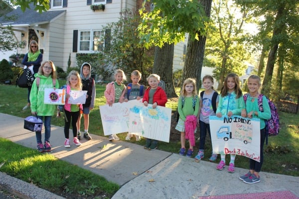 Forest Avenue students display their entries for the Verona Environmental Commission (VEC) “Walk/Bike to School’ poster contest. (back) Committee Chair, Amanda Weil; (front) Kaelin Walsh, Molly Walsh, Jack Davis, C.C. Weil, Stephen Weil, Liam Allworth, Kathryn Pietrucha, Kaitlyn Pietrucha, Kylie Conklin, and Isabelle Heimerle.
