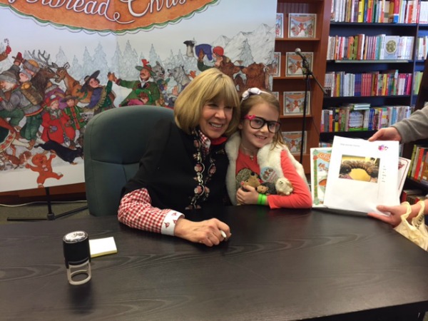 Kate with her favorite author, Jan Brett.
