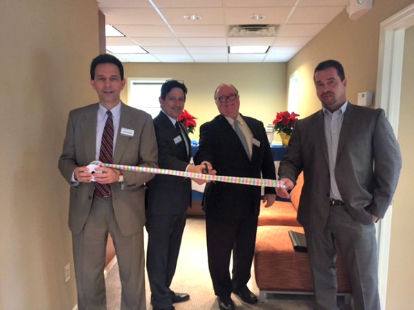 At the Two Rivers Title grand opening in Verona: Michael Snyder, sales manager and senior account executive; Matthew Cohen, Esq., owner and principal; Ralph Powell, senior title officer and account executive; and Bennie Henderson, senior account executive.
